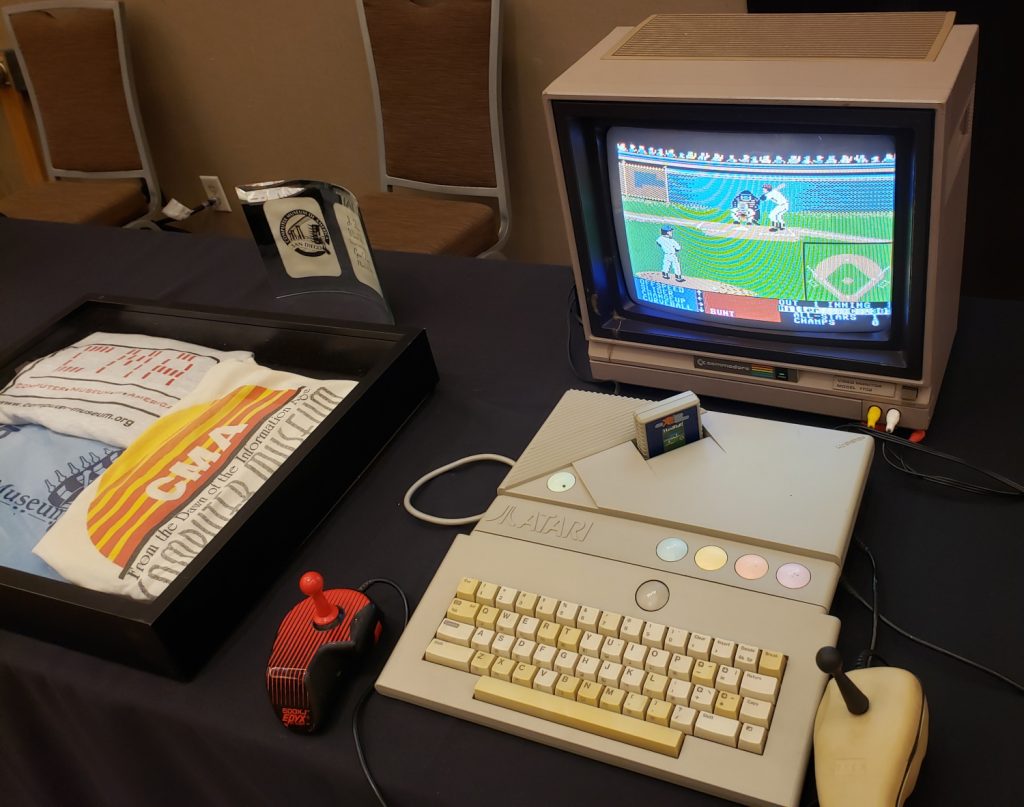 "Hardball" running on an Atari XEGS, and some t-shirts that were sold at the old CMA campus.